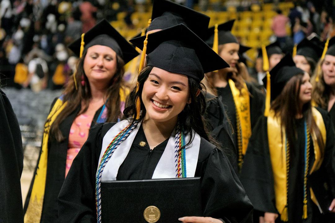 USM student smiles at graduation